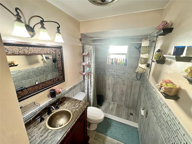 bathroom with vanity, toilet, tile patterned floors, and a shower with shower curtain