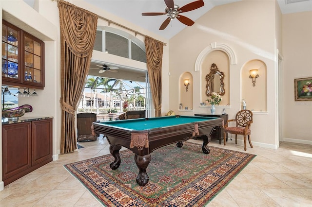 game room featuring pool table, high vaulted ceiling, and light tile patterned floors