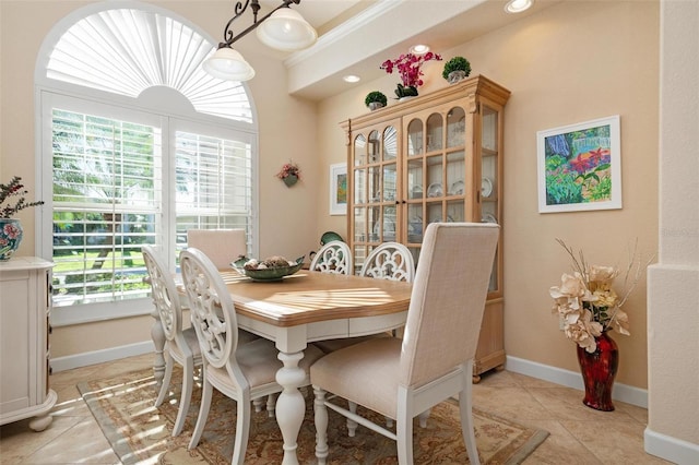 dining area with light tile patterned flooring