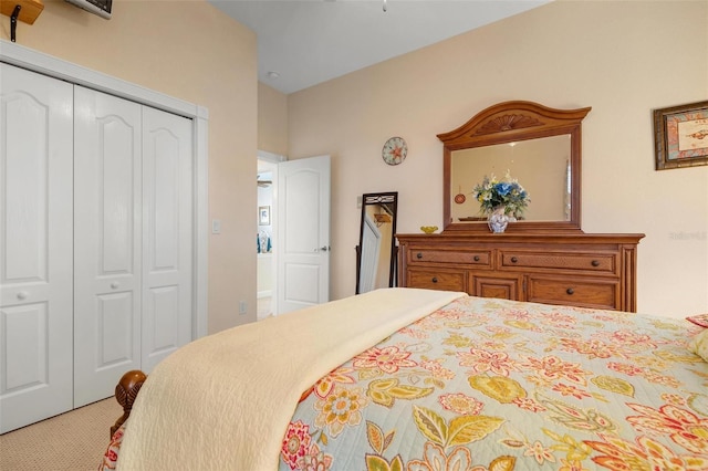 carpeted bedroom with a closet