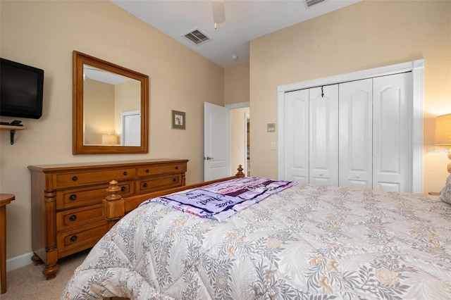 bedroom with light carpet, a closet, and ceiling fan