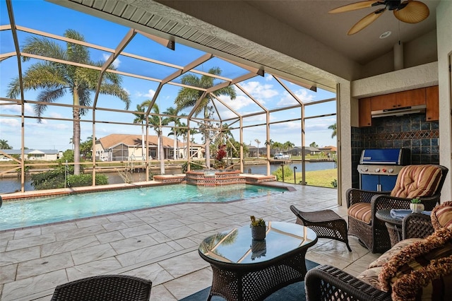 view of pool featuring area for grilling, glass enclosure, a patio, ceiling fan, and a water view