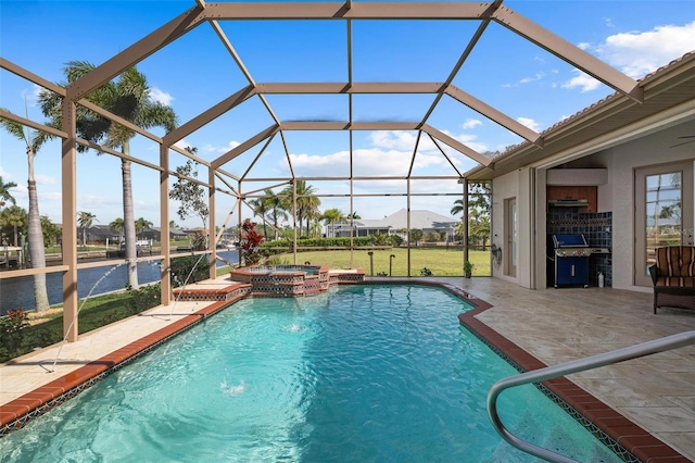 view of pool with pool water feature, a lanai, a patio area, an in ground hot tub, and a lawn