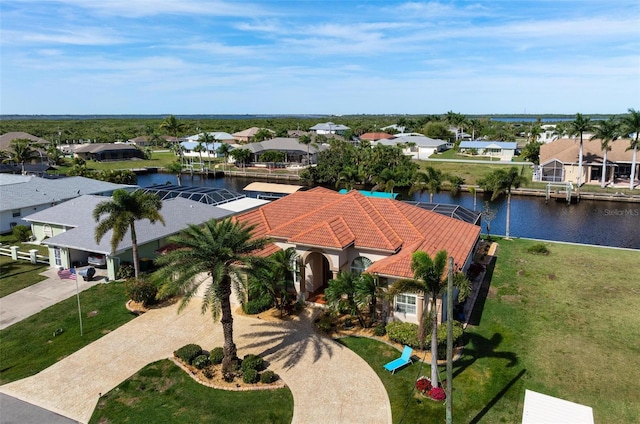 bird's eye view with a water view