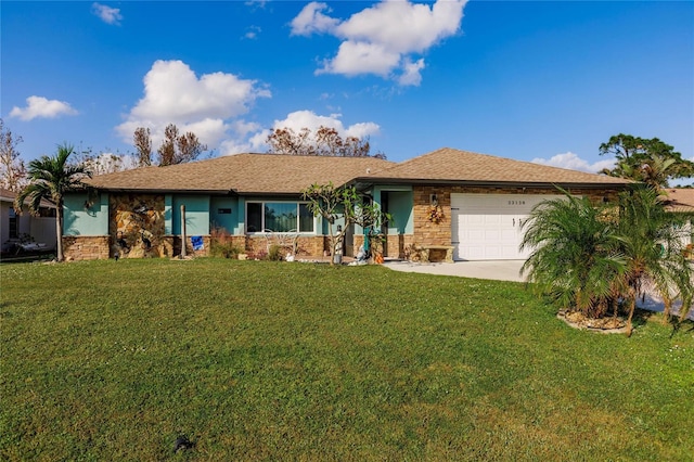 ranch-style house featuring a garage and a front lawn