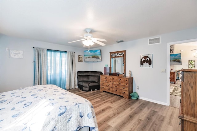 bedroom featuring wood-type flooring and ceiling fan