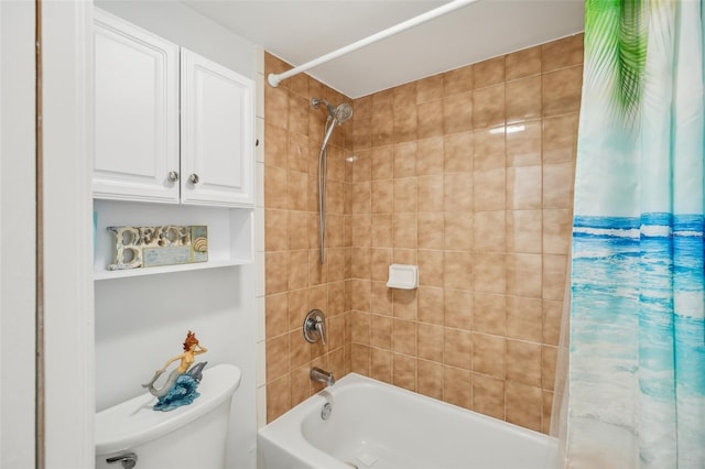 bathroom with shower / bath combo and toilet