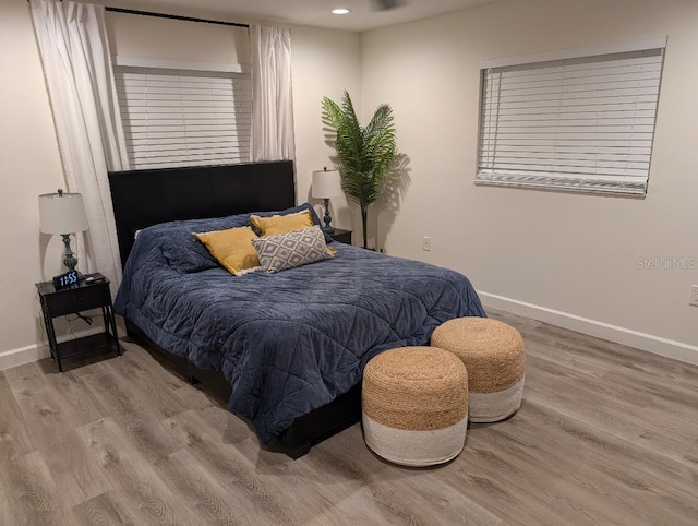 bedroom featuring hardwood / wood-style flooring