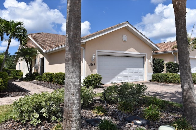 single story home with a garage