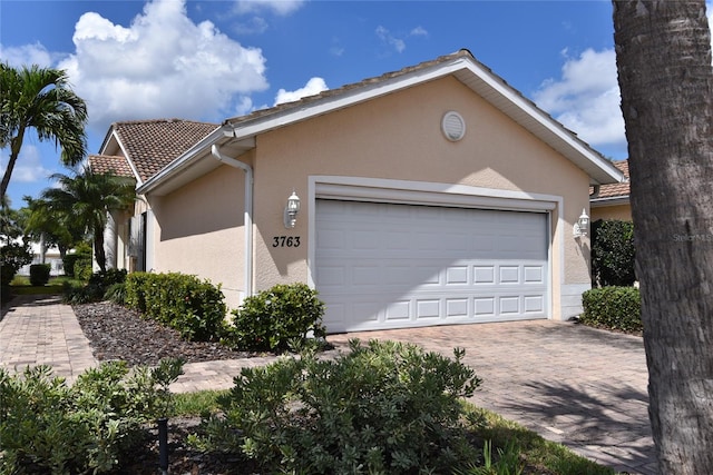 view of front of property with a garage