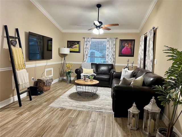 living room featuring crown molding, light hardwood / wood-style flooring, and ceiling fan