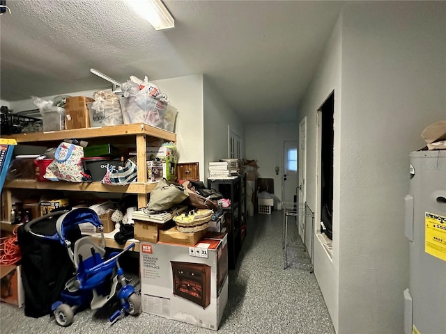 storage room featuring water heater