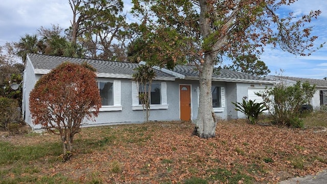 ranch-style house with a garage