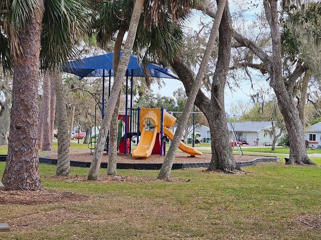 view of jungle gym with a yard