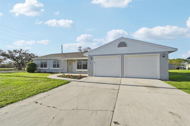 ranch-style home featuring a garage and a front yard