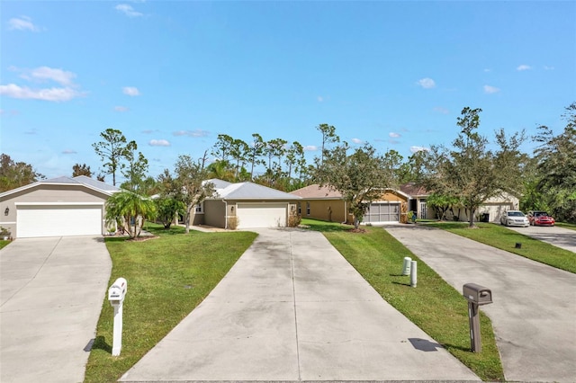 single story home featuring a garage and a front lawn