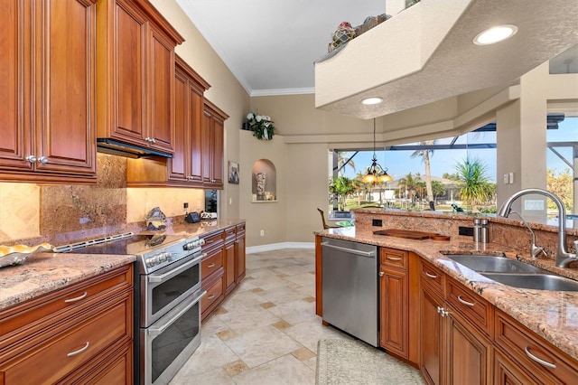 kitchen featuring hanging light fixtures, a textured ceiling, sink, crown molding, and stainless steel appliances