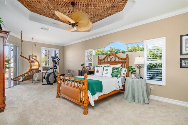 carpeted bedroom featuring multiple windows, ornamental molding, and ceiling fan