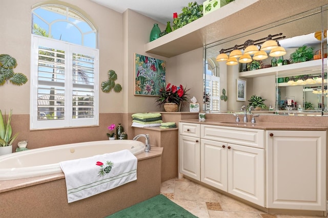 bathroom with vanity and a washtub