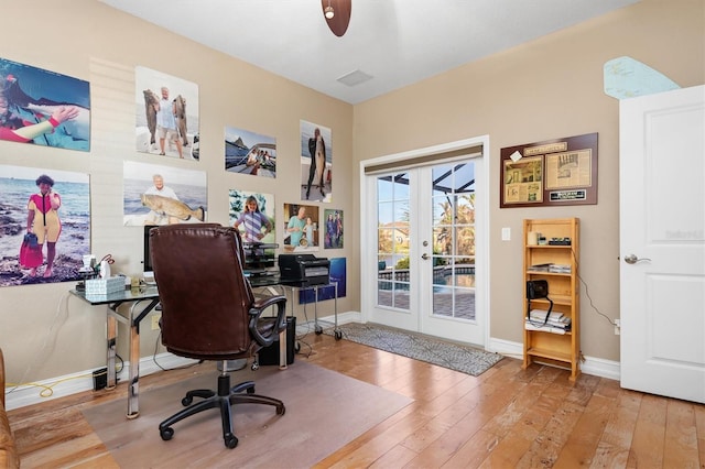 office area with french doors, ceiling fan, and hardwood / wood-style flooring