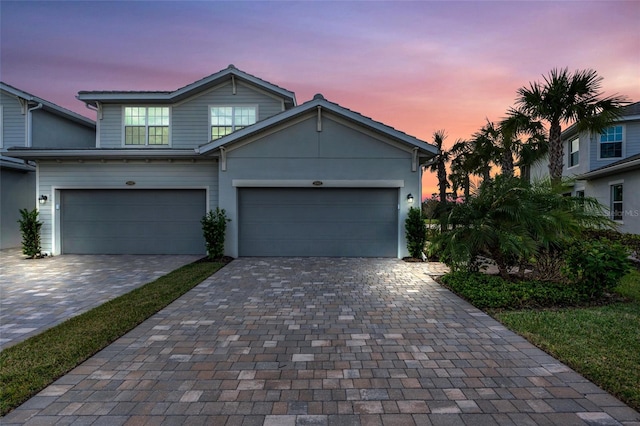 view of front of property with a garage