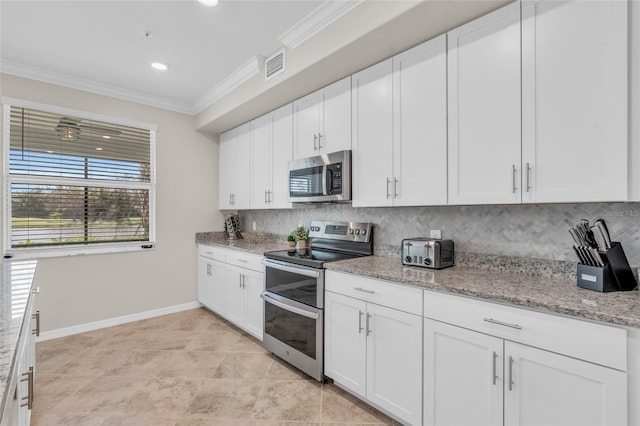 kitchen with stainless steel appliances, crown molding, light stone countertops, white cabinets, and tasteful backsplash