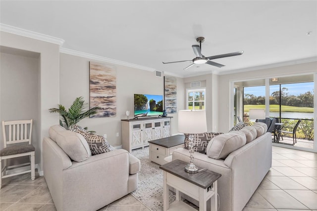 living room featuring ornamental molding, ceiling fan, and light tile patterned floors