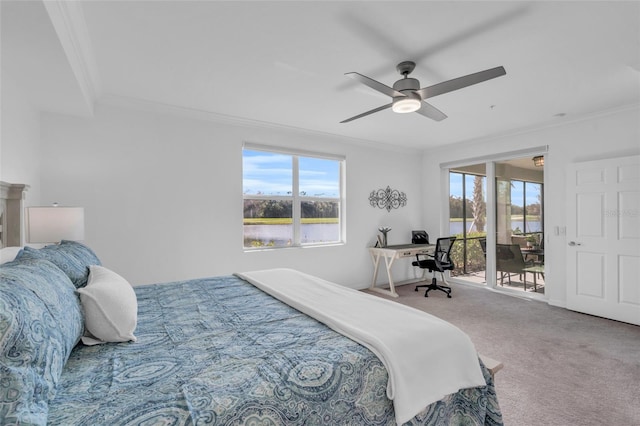 carpeted bedroom featuring ornamental molding, access to exterior, a water view, and ceiling fan