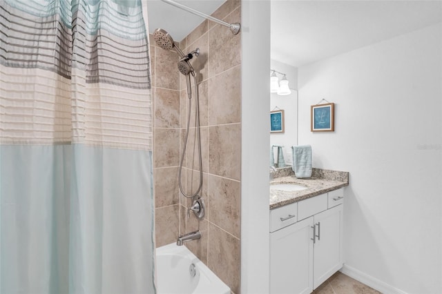 bathroom featuring vanity and shower / tub combo