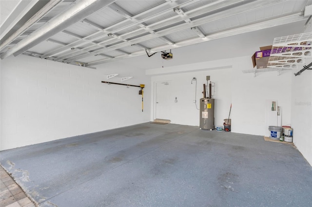 garage with a garage door opener and water heater