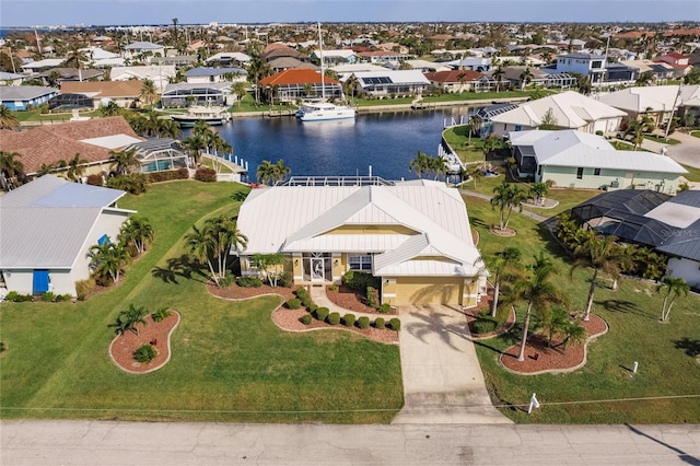 aerial view featuring a water view