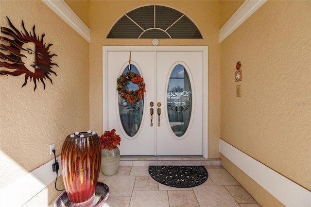 doorway to property featuring french doors