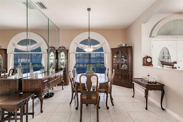 dining room featuring light tile patterned flooring