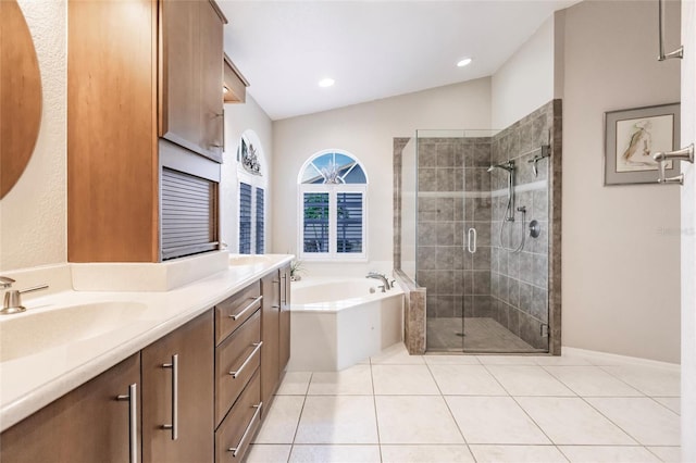 bathroom with vanity, plus walk in shower, lofted ceiling, and tile patterned floors