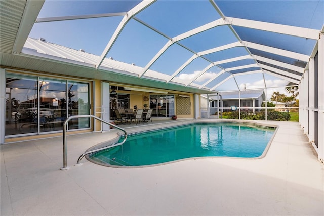 view of pool featuring a patio and a lanai