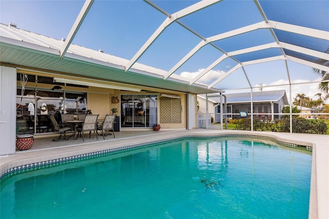 view of pool featuring a lanai and a patio area