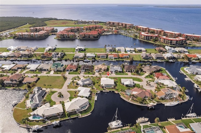 bird's eye view with a water view