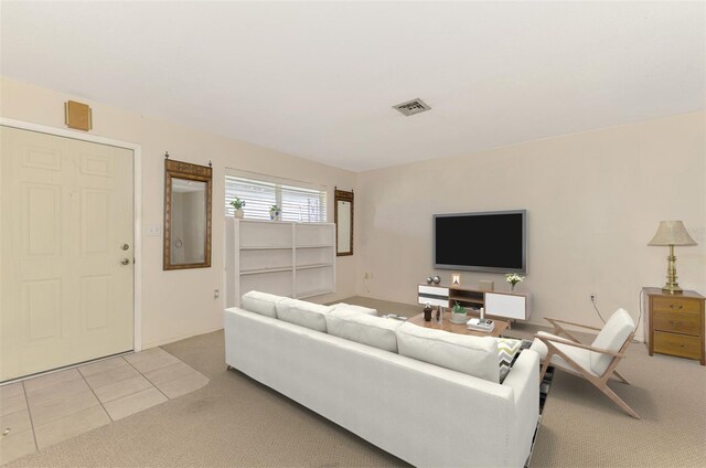 living room with light colored carpet