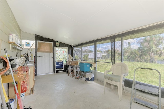 sunroom / solarium with vaulted ceiling