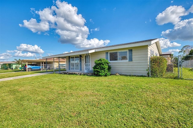 view of front of property featuring a carport and a front lawn