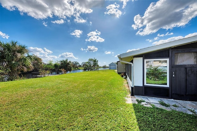 view of yard featuring a water view