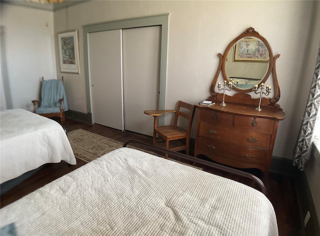 bedroom featuring a closet and hardwood / wood-style flooring