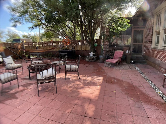 view of patio / terrace featuring a fire pit