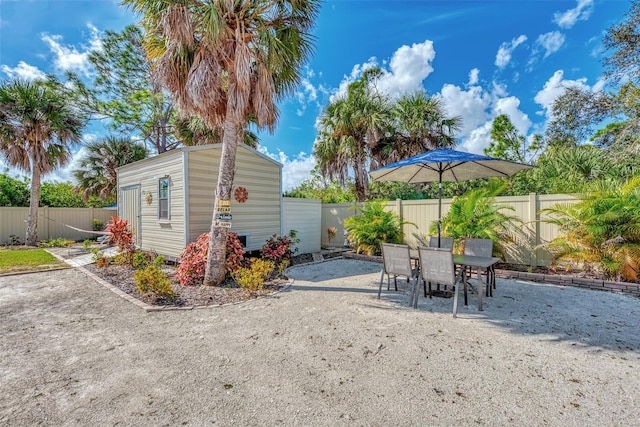 view of patio / terrace featuring an outbuilding