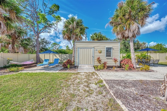 view of outdoor structure featuring a yard