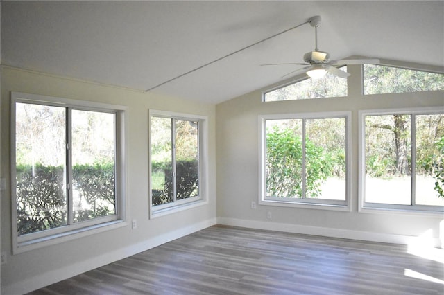 unfurnished sunroom with ceiling fan and lofted ceiling