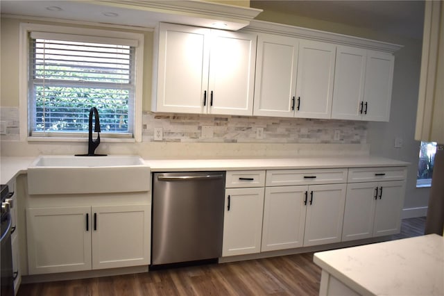 kitchen featuring dark hardwood / wood-style flooring, backsplash, sink, dishwasher, and white cabinetry