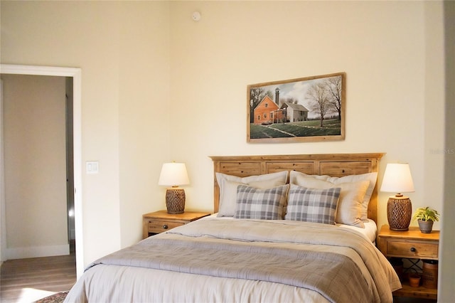 bedroom featuring wood-type flooring