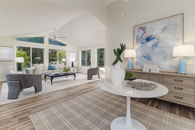 956 Harbor Town Dr, Venice, FL 34292 - living room with ceiling fan, wood finished floors, lofted ceiling, and baseboards