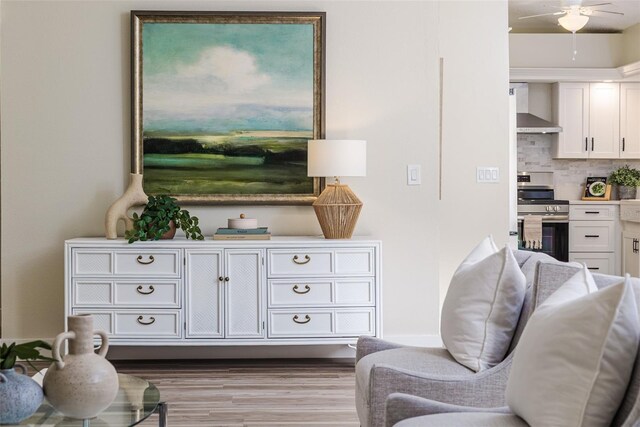 956 Harbor Town Dr, Venice, FL 34292 - living area featuring ceiling fan and wood finished floors